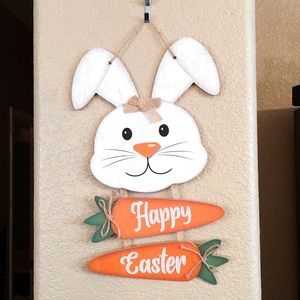 Easter decoration with bunny rabbit and carrots "Happy Easter"